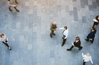 men-shaking-hands-street